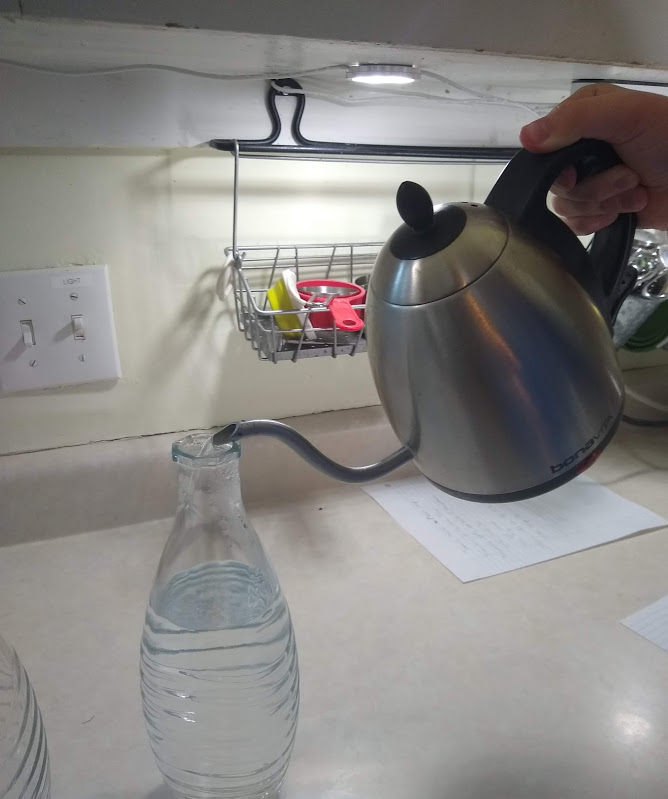 Image of Bottle filling with hot water